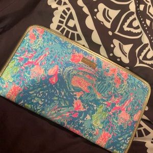 Lilly Pulitzer bright colored floraled clutch